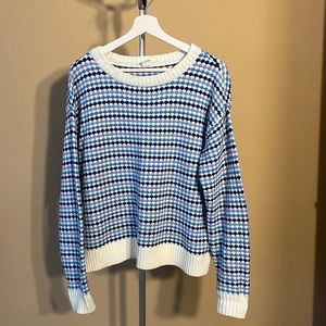 Multicolored sweater.